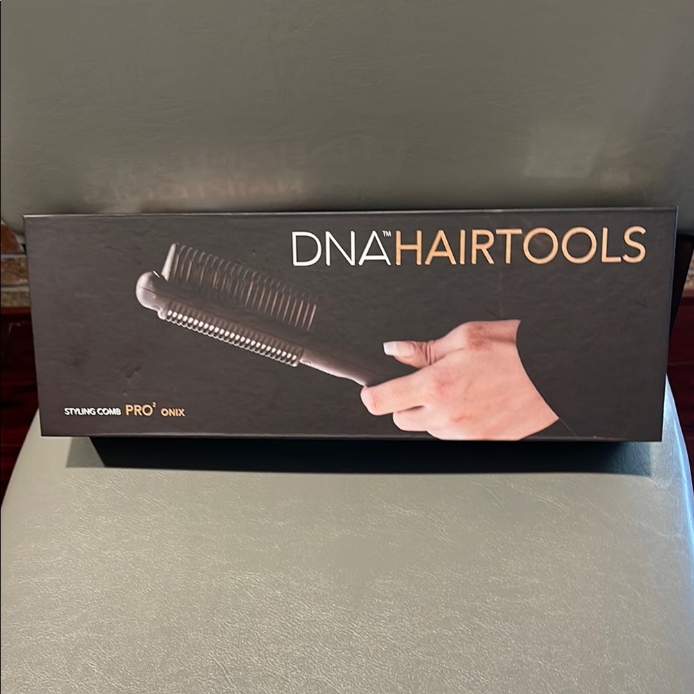 Luxury styling tool, new. DNA Couture Hair Tools - Black and Silver Styling Comb
